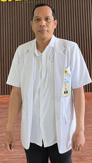 Foto drg. Andi Gunawan Sihombing